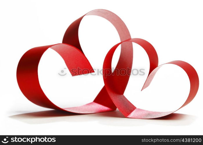 Ribbons shaped as hearts on white, valentines day concept