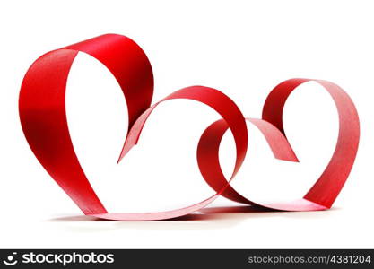 Ribbons shaped as hearts on white, valentines day concept