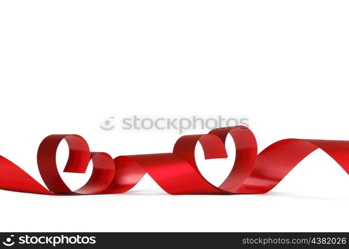 Ribbons shaped as hearts on white, valentines day concept