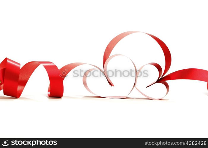 Ribbons shaped as hearts on white, valentines day concept