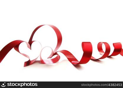 Ribbons shaped as hearts on white, valentines day concept