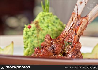 ribs calf with potato puree and vegetables