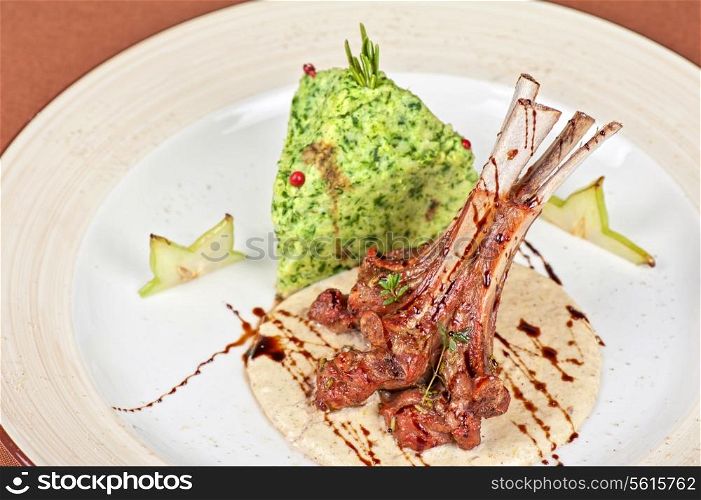 ribs calf with potato puree and vegetables