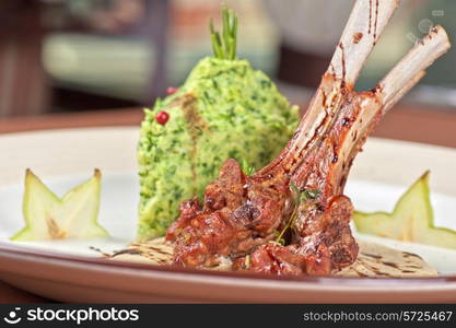 ribs calf with potato puree and vegetables