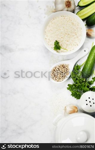 Rice and raw fresh vegetables - cooking, healthy eating or vegetarian concept