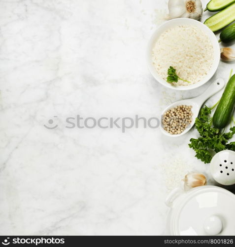 Rice and raw fresh vegetables - cooking, healthy eating or vegetarian concept