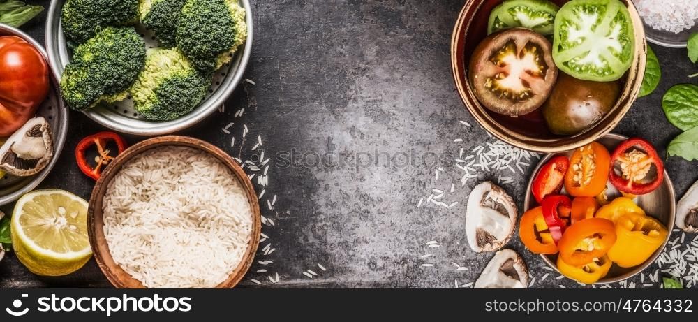 Rice and vegetables cooking ingredients in bowls on dark rustic background, banner. Healthy and vegetarian food or diet nutrition concept.
