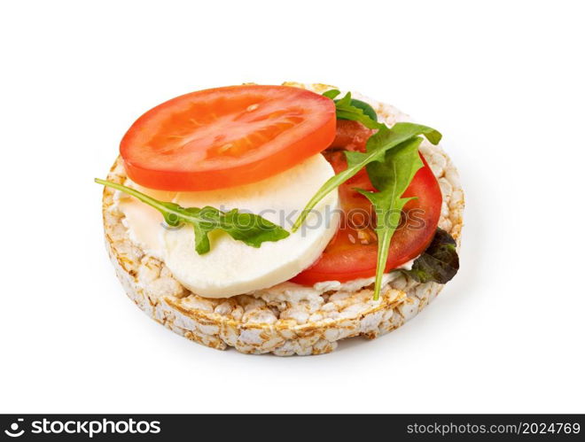 Rice cakes with cream cheese, tomato and mozzarella. isolated on white background. Rice cakes with cream cheese, tomato and mozzarella.