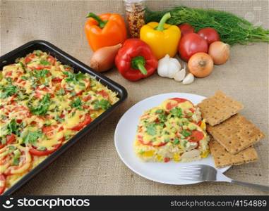 Rice casserole with vegetables Chicken fillet with tomato and cheese