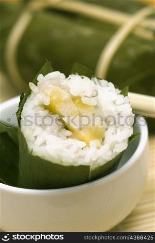 Rice dumplings served in a bowl