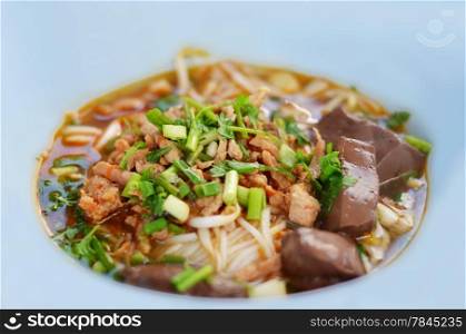 rice noodles with spicy pork sauce , Thai cuisine