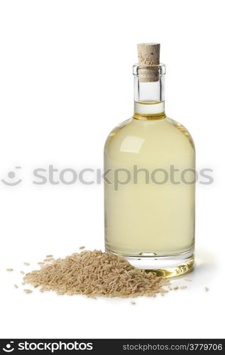 Rice oil in a bottle on white background