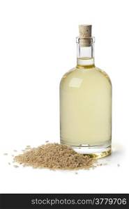 Rice oil in a bottle on white background