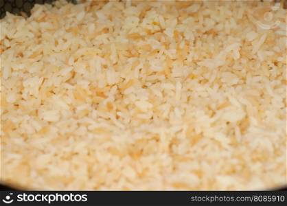rice on frying pan, skillet