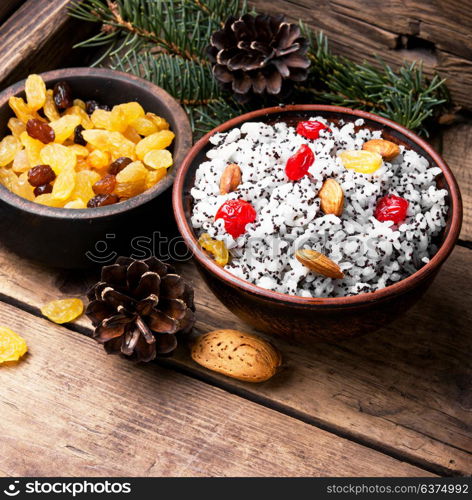 rice porridge with nuts and raisins. national Russian Christmas dish, a porridge with raisins and almonds, kutya