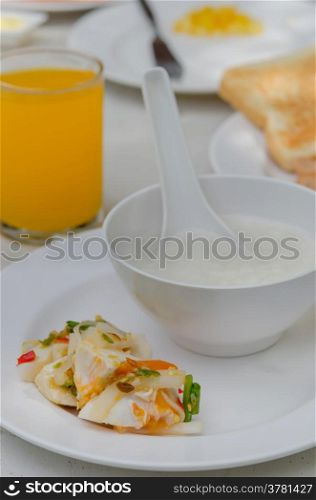 rice soup breakfast. Healthy rice soup with spicy salted egg salad
