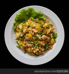 Rice with chicken meat. Rice with chicken meat and vegetables