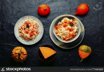 Rice with fragrant and juicy pumpkin. Vegetable pilaf. Fragrant pumpkin risotto