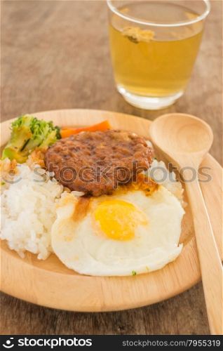 Rice with hamburg steak and fried egg, stock photo