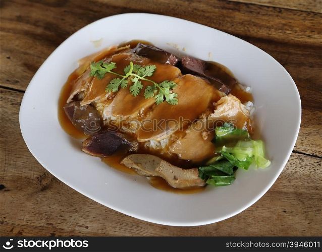 Rice with roast duck, sliced restaurant presentation, asian cuisine