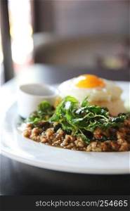 Rice with stir fried pork and basil with egg