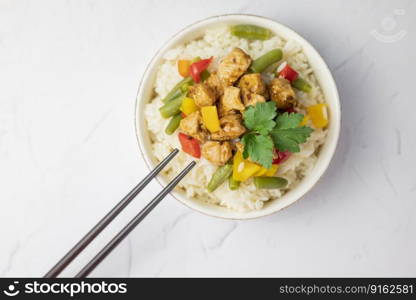 rice with vegetables and meat kung pao asian dish side dish with pork or beef on a plate for restaurant menu