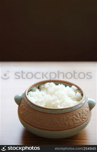 Rice with wood background
