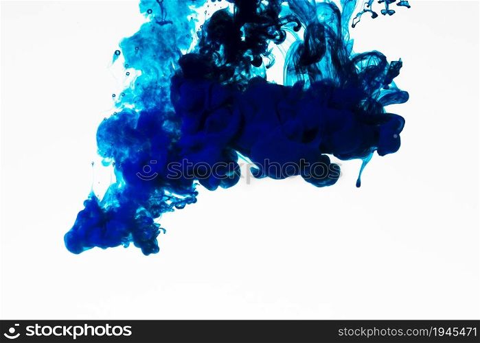 rich blue colored ink droplet. High resolution photo. rich blue colored ink droplet. High quality photo