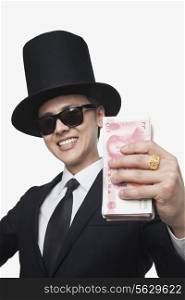 Rich Man Holding Money to Camera