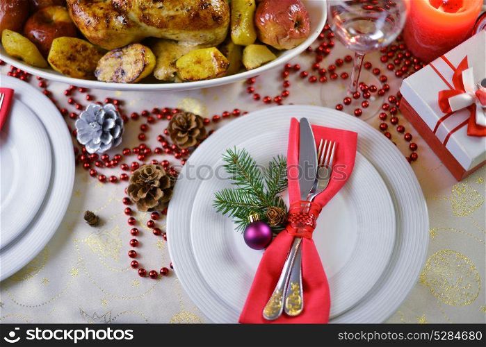 rich table setting for Christmas dinner