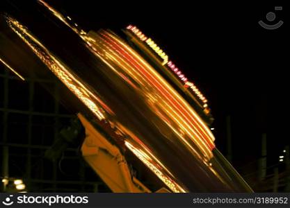 Ride in an amusement park at night, San Diego, California, USA
