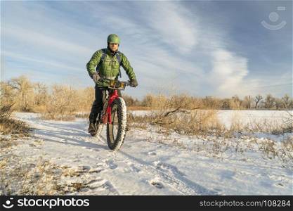 riding a fat mountain bike in winter, cold day in Colorado