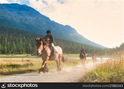 Riding on a mountain dirt road in the Swiss Alps