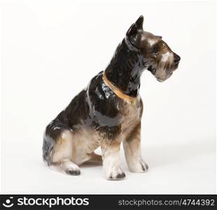 Riesenschnauzer. Ceramic figurine, dog breed isolated on white