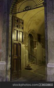 Rieti, Lazio, Italy: historic buildings near the cathedral square by night