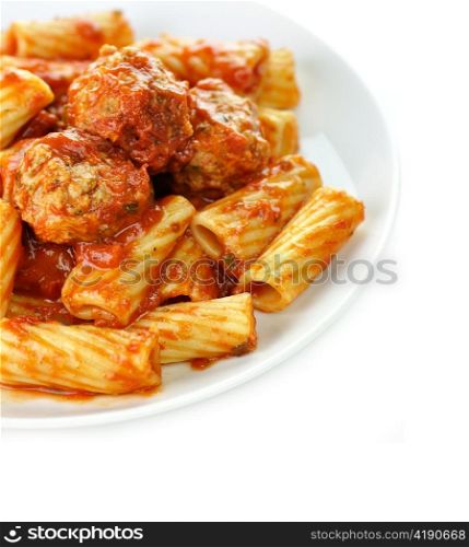 Rigatoni with tomato sauce and meatballs.