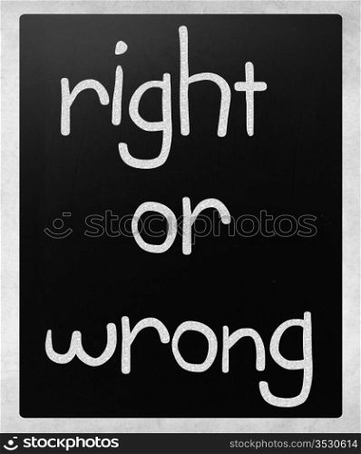 ""Right or wrong" handwritten with white chalk on a blackboard"