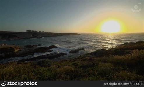 Right pan of a dramatic sunset at Spoonera??s Cove