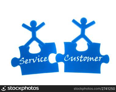 Right service to customer. Two people rise hands and stand on top of puzzles.
