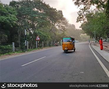 Riksha driving early morning in Tiruvanamalai India