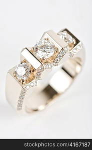 Ring of gold and white gold on white