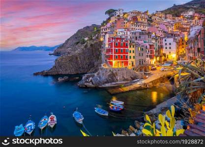 Riomaggiore, Colorful cityscape on the mountains over Mediterranean sea in Cinque Terre Italy Europe