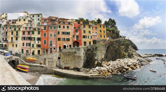 Riomaggiore fisherman village, is one of five famous colorful villages of Cinque Terre in Italy.