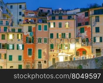 Riomaggiore. Italian village on the coast.. Riomaggiore village in the Cinque Terre National Park on the sunset. Italy. Liguria.
