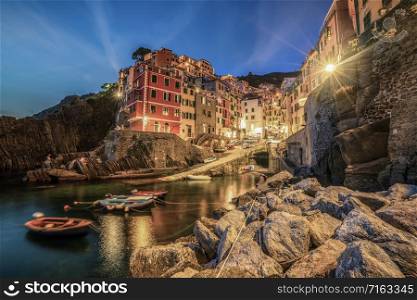 Riomaggiore of Cinque Terre, Italy - Traditional fishing village in La Spezia, situate in coastline of Liguria of Italy. Riomaggiore is one of the five Cinque Terre travel attractions.