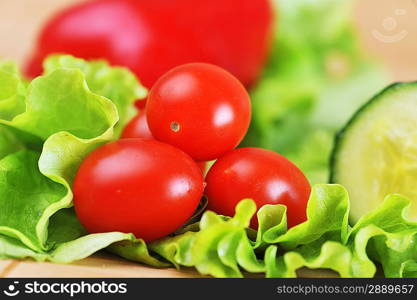 ripe and juicy cherry tomatoes and lettuce