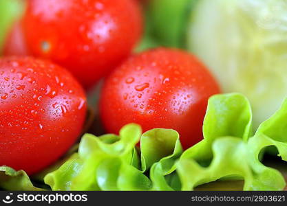 ripe and juicy cherry tomatoes and lettuce