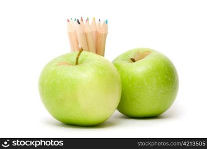 Ripe apples fruit and color pencils isolated on white background