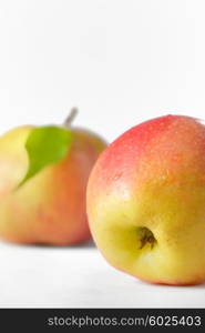 Ripe apples fruit with leaves and water drops