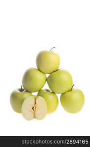 Ripe apples lie on white surface